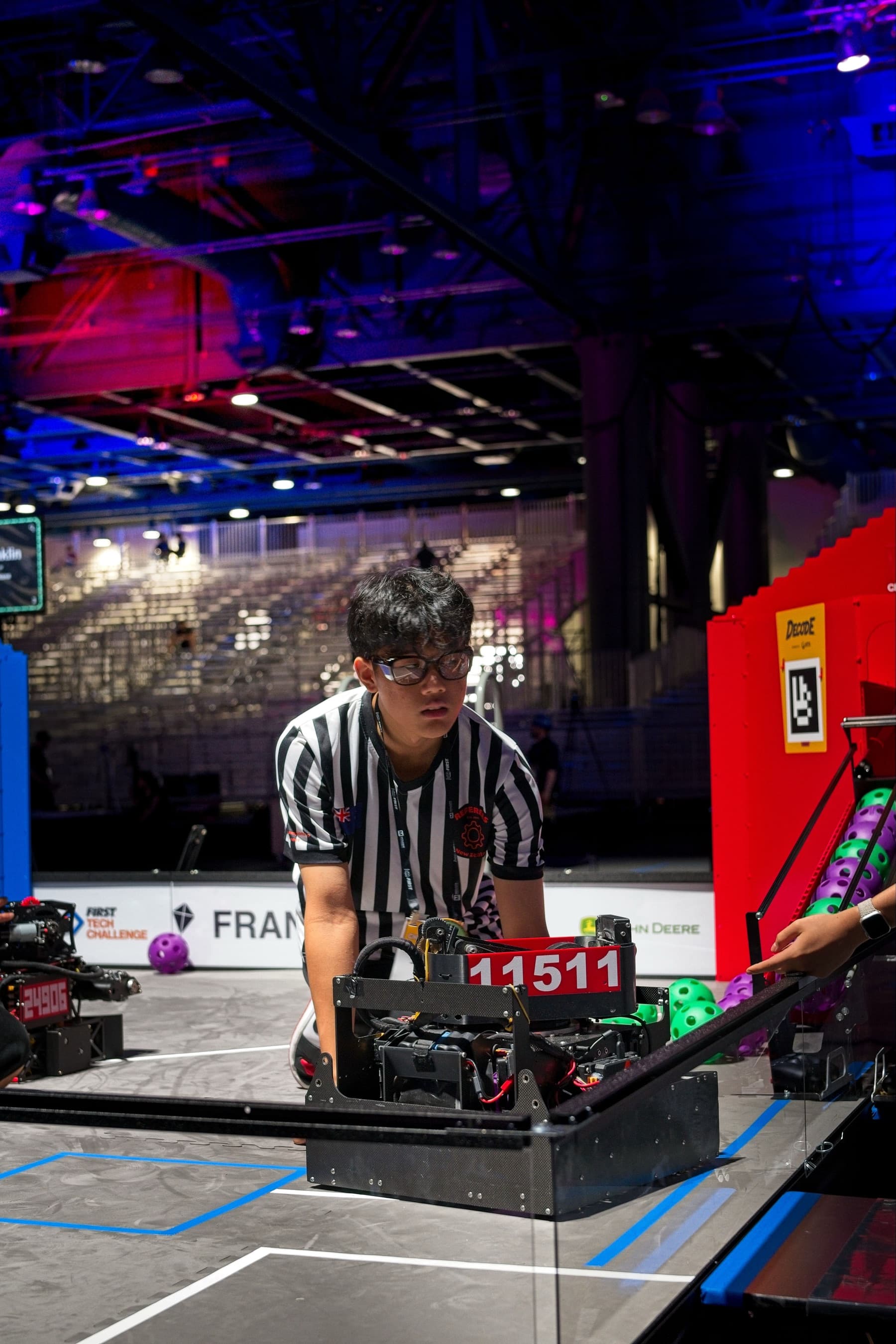 CMR referee team setting up robot systems at worlds